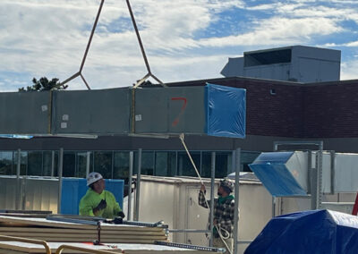 Crew Overseeing Shaft Being Placed